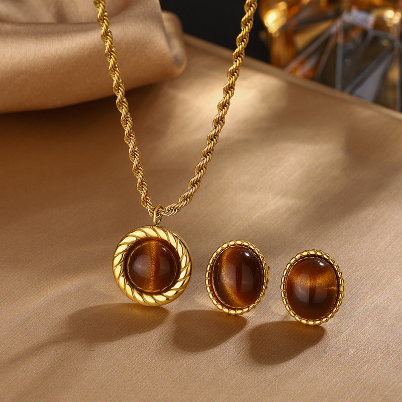 Golden Tiger Eye Glow – Edelstahl Schmuckset mit Tigerauge-Anhänger