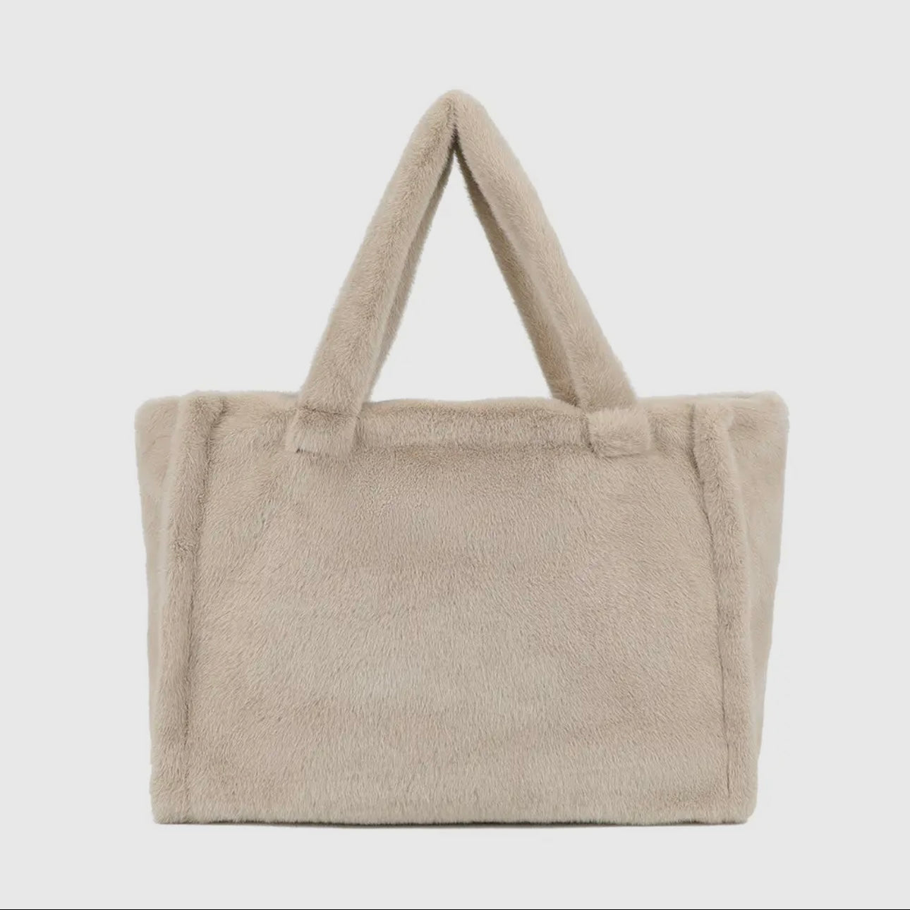 Mélya Tasche – Flauschige Eleganz
