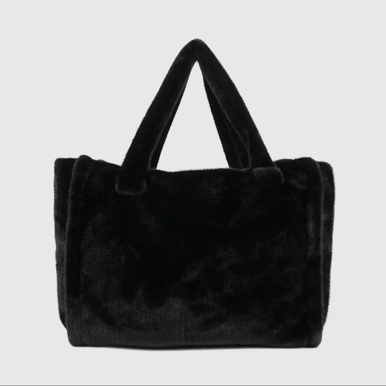 Mélya Tasche – Flauschige Eleganz